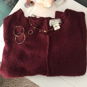red maroon knit v neck sweater